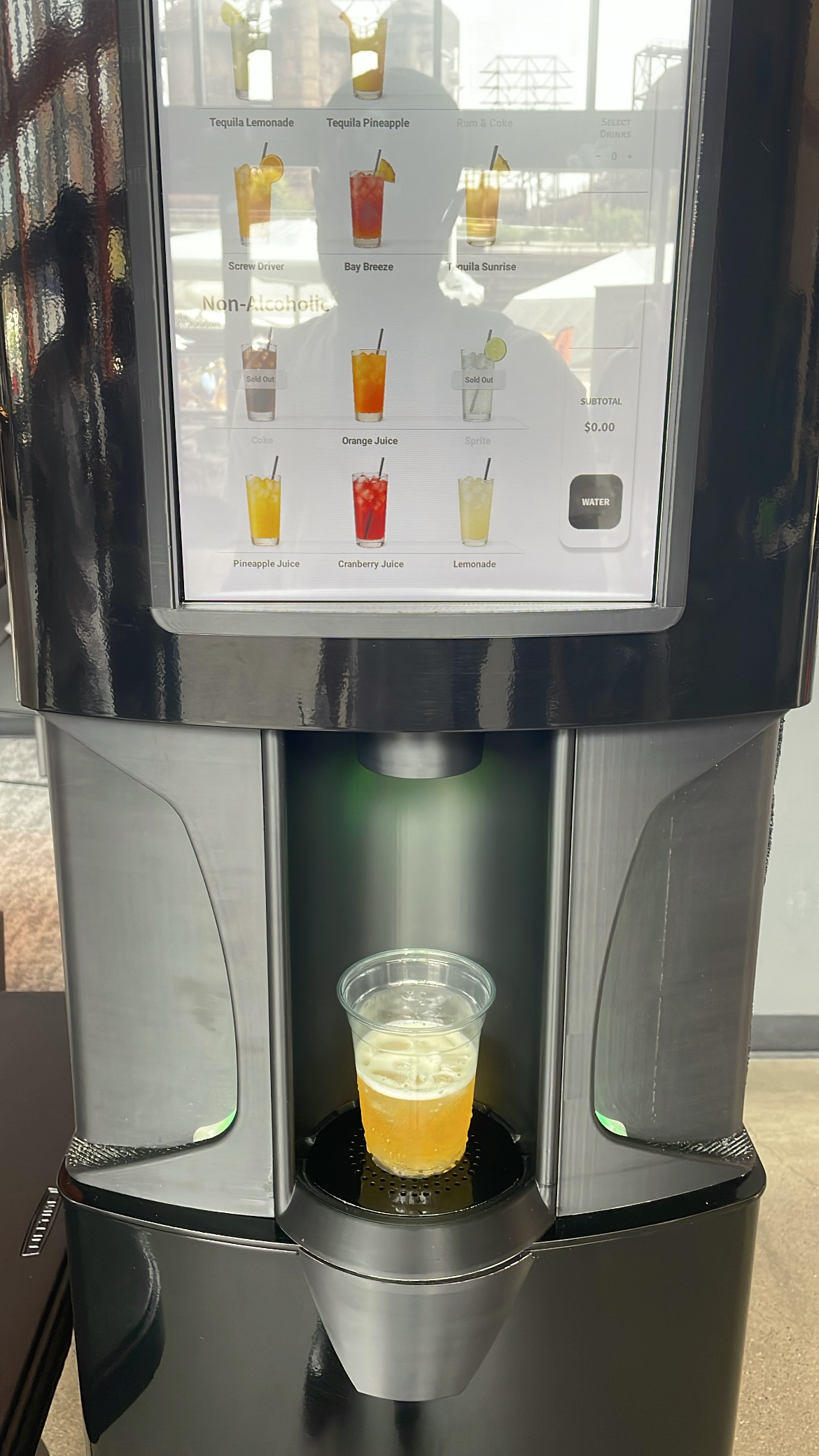 Close-up of the Sylf self-service alcohol dispenser